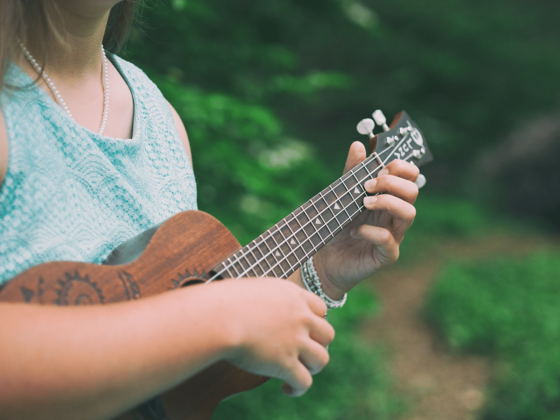 Playing the ukulele, a Hawaiian cultural tradition