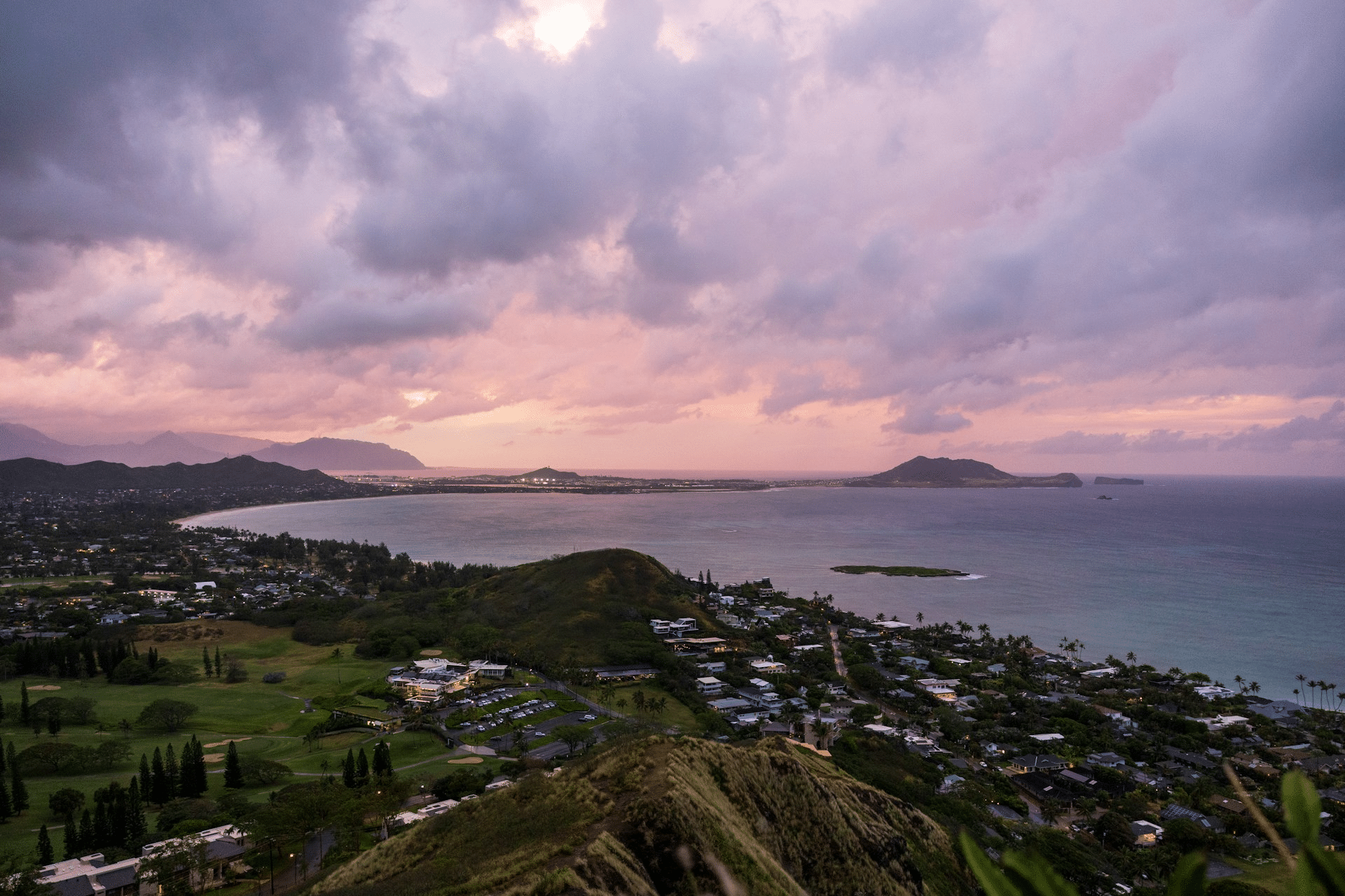 Sunset over a ridge trail on Oahu