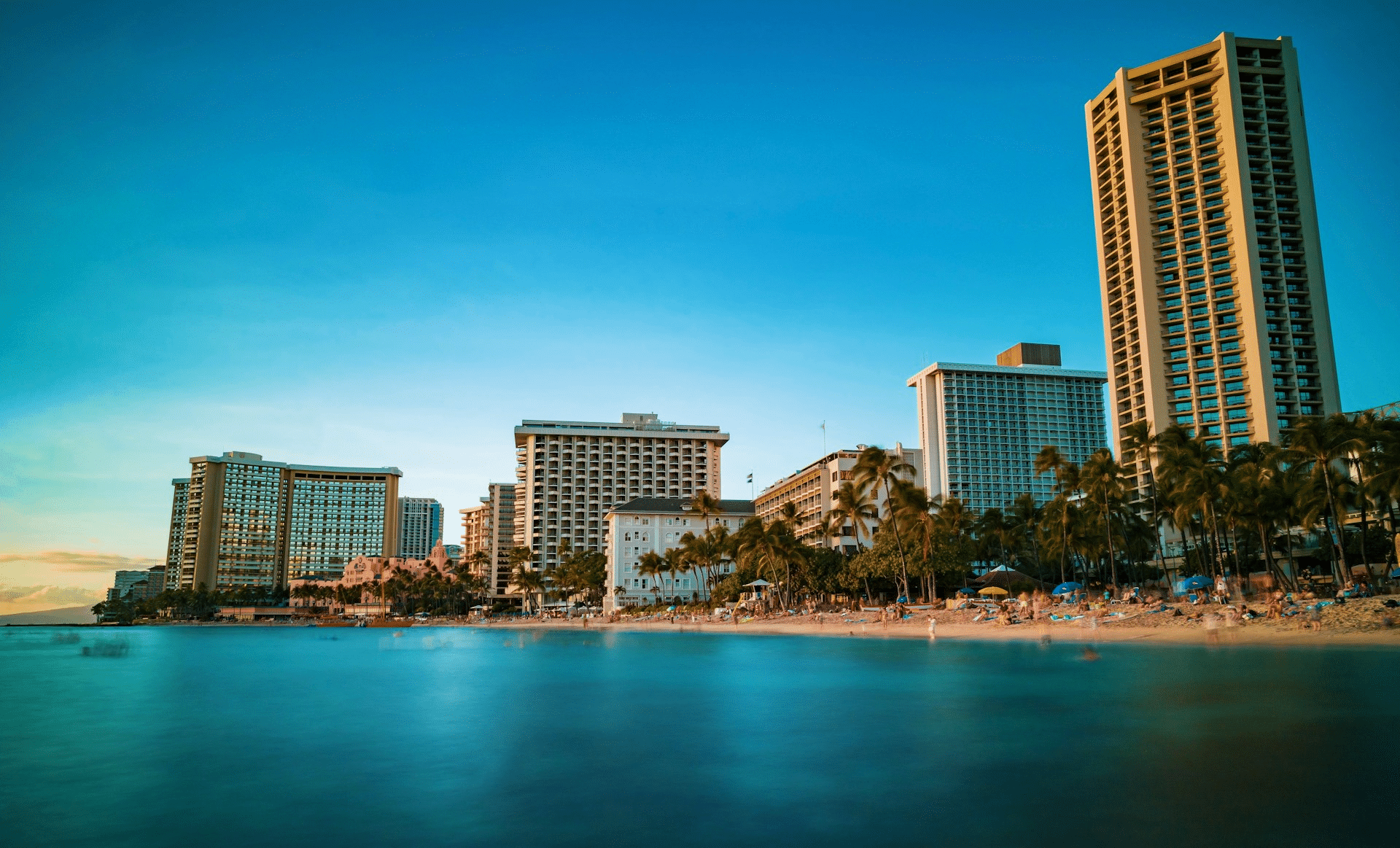 Surfing at Waikiki Beach, one of the top things to do in Oahu